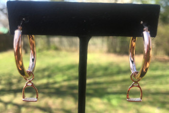 These swingy hoop earrings are cute and have a sweet English stirrup dangle. They are available in sterling silver and all the gold metals. Pictured are the ones in rose gold a very popular metal. Please call 8593330458 with questions.