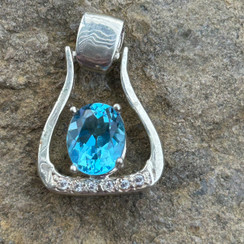 Western Stirrup in sterling silver with swiss blue topaz