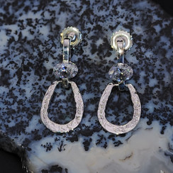 Sterling silver door knocker horseshoe earrings with 8x6 cz. Available in hammered or smooth horseshoe. These are available in any metal or with any gemstone or both. Call 8593330458 to customize.