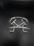 A impressive snaffle bit bracelet in sterling silver. It is over 1 inch tall and fits most wrists.