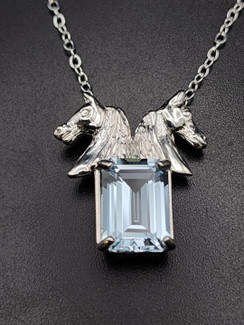 Horse head necklace with sky blue topaz