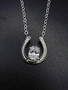 A Sterling silver horseshoe necklace is a classic for an equine fashion look. This comes with an 18-inch chain. Please call 8593330458 to customize.