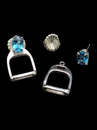 A sterling silver jacket for your studs. These English stirrup earrings can be used with any gem as a stud. You can order the studs by calling 8593330458. The also are available in gold.