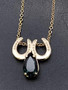 A stunning teal pear tourmaline with 2 14K yellow gold horseshoes. This is a pendant and can be worn with your gold chain or ours and is a very unique piece. You can order a chain if you wish call 8593330458 for help