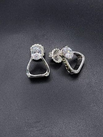 A 8x6 cubic zirconium is placed on top of a western stirrup. The post is placed behind the gemstone and is perfect or those with small ear lobes. This can be ordered with any metal with any gemstone.