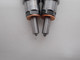 New nozzle vs traditional 6 hole nozzle on the right