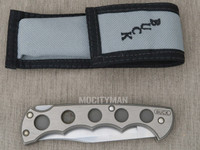 Buck 560 Titanium Handle Folding Knife and Pouch Date Code X 1990 (35584)