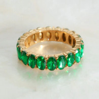 Emerald eternity band ring
