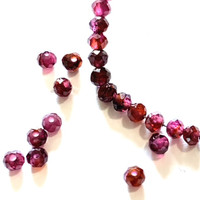 January - 2mm faceted round Garnet - Strength & Safety