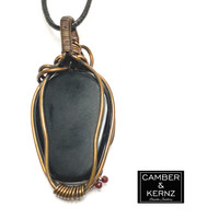 Back view of Carved Black Agate pendant necklace in raw copper