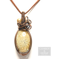 different Front view of tiny flower heads in the Fossilized Coral pendant