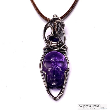 Amethyst skull wrapped in Silver plate wire