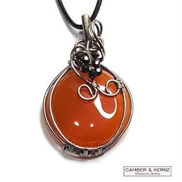 A0090 Vibrant Carnelian Oval Pendant with Faceted black spinels