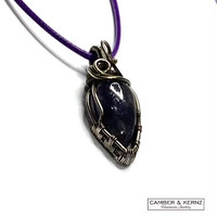 Iolite Pendant showing silver plate wire wrap