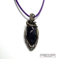 Front view of A0092 Deep Purple Iolite showing quality wrapping and the beautiful silver plate wire bail