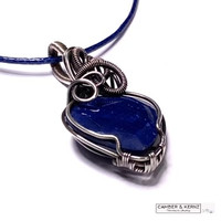 A0079 Sapphire and silver plate pendant with faux leather cord