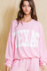 Bucketlist Texas Comfy Graphic Sweatshirt Baby Pink 