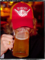 Red and Gold Too Much Rock Trucker Hat