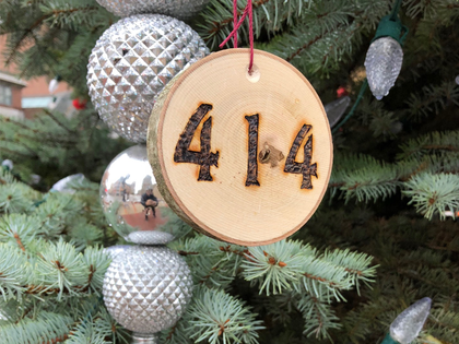 Hand cut from cherry wood, the 414 Milwaukee ornament will look rad hanging from your Christmas tree for the holidays. City Hall Christmas tree not included with purchase. Finish size 4" x 3.5"