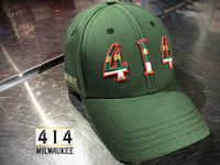 This is a tribute hat to the proud history of the Milwaukee Bucks. The Irish rainbow is a retro design feature running up and down the sides of the home and away uniform of the 1980s. Be proud of the city of Milwaukee and its basketball team. Adjustable, snap back hat. 100% Oxford lightweigh cotton. 