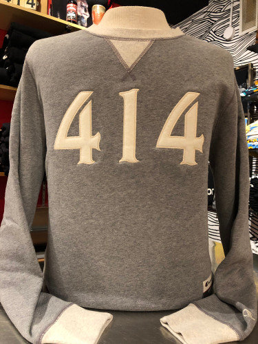 The 414 crew sweatshirt. Sueded fleece with wool embroidered 414 numbers on the front. 8.5 oz., 80/20 ringspun cotton/polyester. 3-end 100% cotton fleece face. Triple-needle stitching throughout. Natural woven twill back neck display. 2x2 rib collar, cuffs, waistband and v-notch. Forward shoulders. Relaxed waistband. Small shown here.