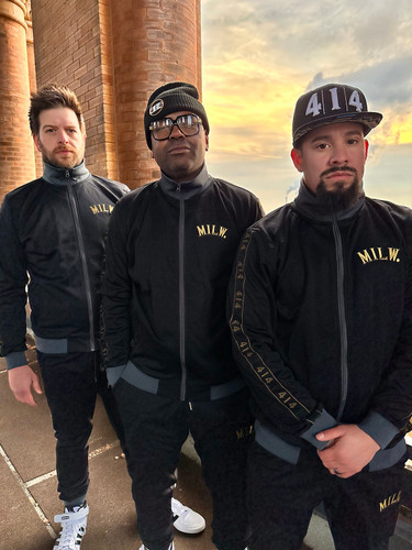 414 Black and Gold Track Mens. Gold embroidery. 414 arm length tape. Slim fit. Full zip with ribbed stand-up collar. 52% cotton, 48% recycled polyester doubleknit. Front zip pockets