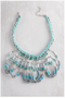 Ryleigh Beaded Bib
Crystal beaded statement necklace with folded tassels.
Length: 17 in. / 43 cm. 
Extension: 3.25 in. / 8.2 cm. 
Drop: 4 in. / 10 cm.
