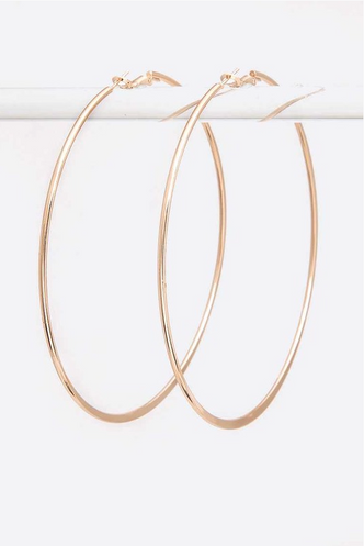 Very large 4"gold hoops. Very JLo ;)