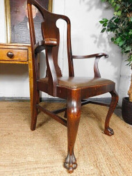 A FINE QUALITY ANTIQUE CARVED OAK ELBOW OR DESK CHAIR