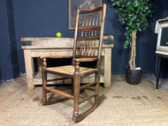 A FINE ANTIQUE COUNTRY HOUSE SPINDLE BACK ROCKING CHAIR