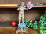 A CHARMING ANTIQUE FIGURAL SCULPTURE CHERUB OR PUTTO