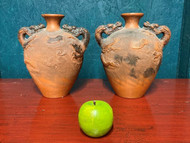 A CHARMING PAIR OF ANTIQUE TERRACOTTA CHINESE URNS