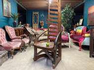 A BESPOKE UNUSUAL ANTIQUE RUSTIC HALL OR STATEMENT ARMCHAIR