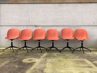 A GOOD SET OF 6 ORANGE CONTEMPORARY AND MID CENTURY STYLED DINING CHAIRS