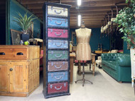 A CHARMING VINTAGE 8 DRAWER SUITCASE CHEST OF DRAWERS