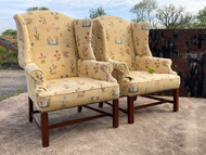 A FINE AMPLE SIZED PAIR OF GEORGIAN STYLED ARMCHAIRS IN WOVEN FABRICS