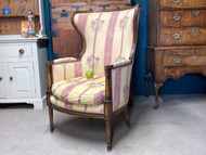 A CHARMING VINTAGE PORTERS ARMCHAIR IN THE ARTS AND CRAFTS MANNER