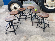 A GOOD SET OF 6 INDUSTRIAL STYLED SWIVEL STOOLS
