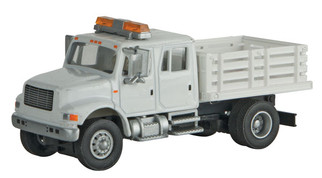 949-11894 HO Scale Walthers SceneMaster International 4900 Open Stake Bed Utility Truck-White w/Railroad Decal