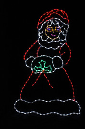 Red and white LED light display of Mrs. Claus outdoor decoration with a touch of green holly