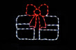White LED Christmas package with a pretty red bow