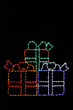Three colorful LED Christmas packages stacked for display