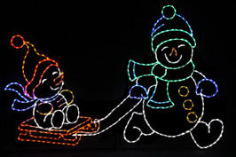 Two LED snowmen adorn in colorful hats, scarves and mittens; one snowman is pulling the other on a red sleigh