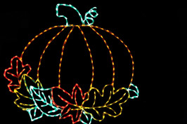 LED light display of a beautiful orange pumpkin with a green stem surrounded by colorful leaves