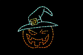 Orange LED jack-o-lantern winking wearing a green witches hat