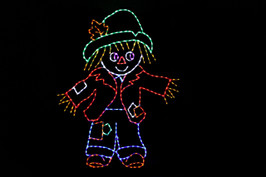 Green, red and blue LED light display of a scarecrow