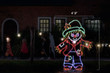 Green, red and blue LED light display of a scarecrow with dimensions 4'9" by 6'2"