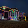 A house showcasing vibrant Christmas light displays.
