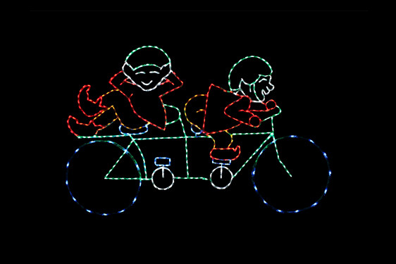 Light display of elves on a bicycle.