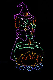 LED display of a witch stirring a green pot of witches brew over a red and yellow fire with blue logs.